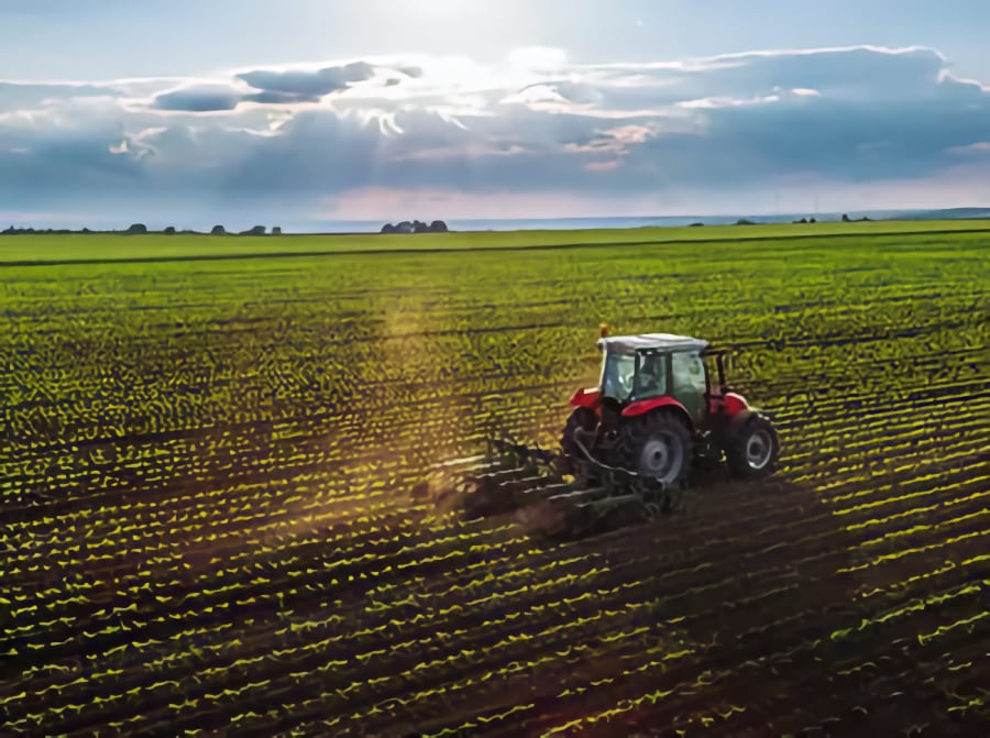 Tractor Farming in Field